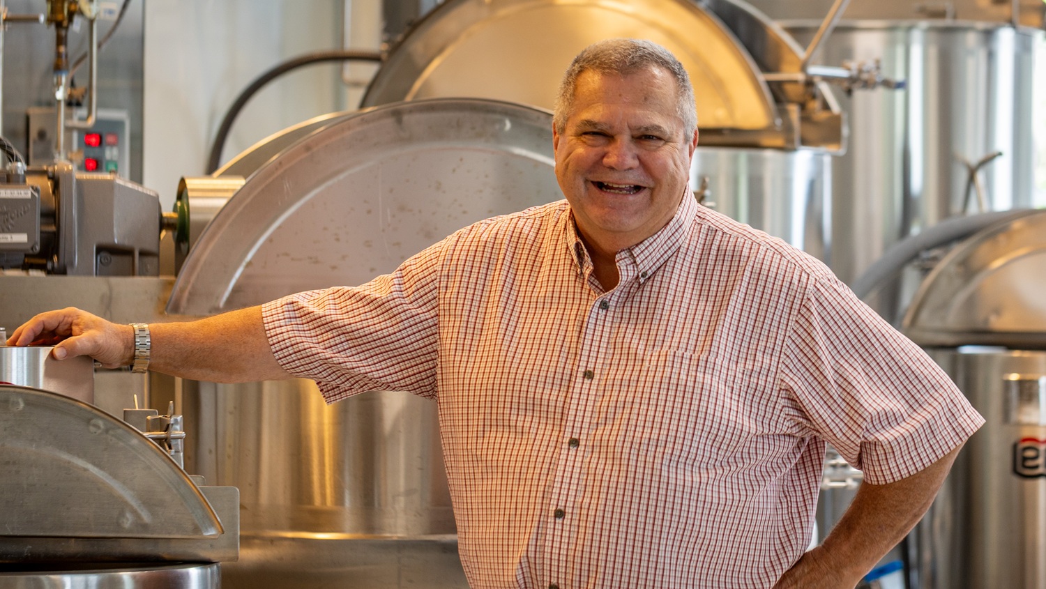 Bill Aimutis standing in front of equipment at NCFIL