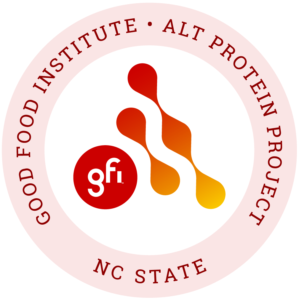 Circular logo of Alt Protein Project university club with yellow-to-red gradient coloring graphics referencing GFI and NC State University